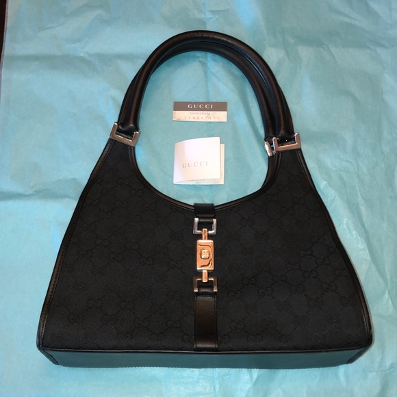 Gucci Handbags - Gucci Iconic Black Canvas GG Bardot Satchel